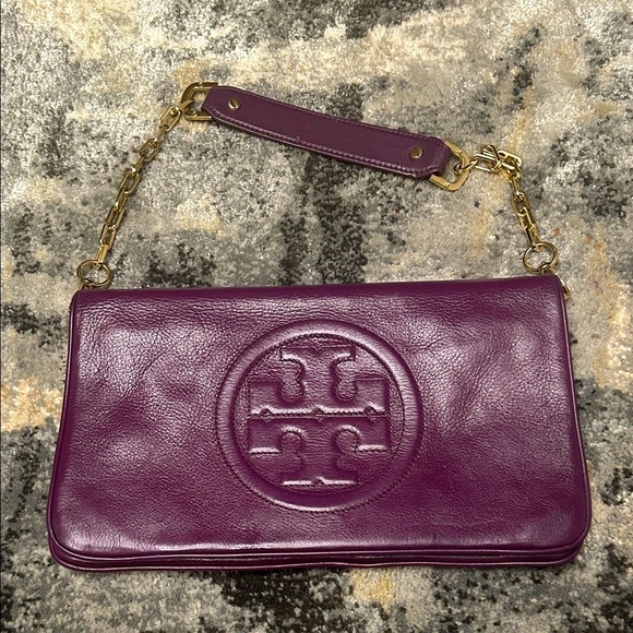 Tory Burch Handbags - Tory Burch Plum/egg plant Leather Clutch with Gold Accents